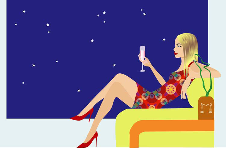 Relaxed girl with a glass of champagne in her hand
